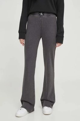 Zdjęcie produktu Calvin Klein Jeans spodnie damskie kolor szary dzwony high waist