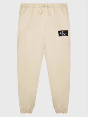 Zdjęcie produktu Calvin Klein Jeans Spodnie dresowe IB0IB01505 Beżowy Regular Fit