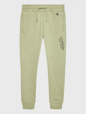Zdjęcie produktu Calvin Klein Jeans Spodnie dresowe Repeat Inst. Logo IB0IB01568 Zielony Regular Fit