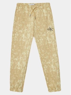 Zdjęcie produktu Calvin Klein Jeans Spodnie dresowe Second Skin IB0IB01932 Beżowy Relaxed Fit