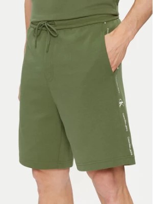 Zdjęcie produktu Calvin Klein Jeans Szorty sportowe Logo Repeat J30J325129 Zielony Regular Fit
