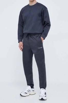 Zdjęcie produktu Calvin Klein Performance spodnie treningowe kolor szary melanżowe