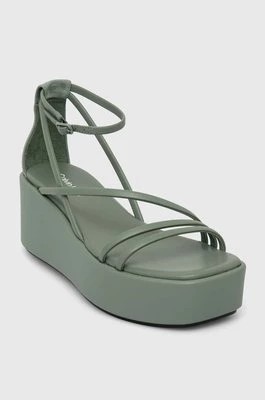 Zdjęcie produktu Calvin Klein sandały skórzane WEDGE SANDAL 30 LTH damskie kolor zielony na platformie HW0HW01949