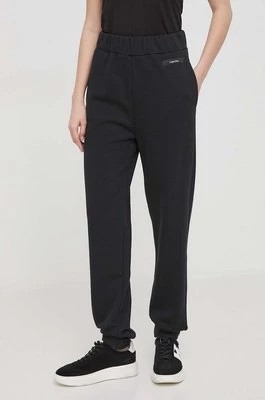 Zdjęcie produktu Calvin Klein spodnie dresowe kolor czarny gładkie
