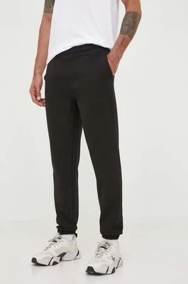 Zdjęcie produktu Calvin Klein spodnie dresowe kolor czarny z aplikacją