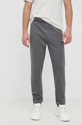 Zdjęcie produktu Calvin Klein spodnie dresowe męskie kolor szary gładkie
