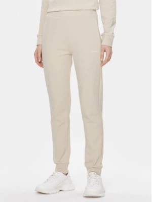 Zdjęcie produktu Calvin Klein Spodnie dresowe Micro Logo Essential K20K204424 Beżowy Slim Fit