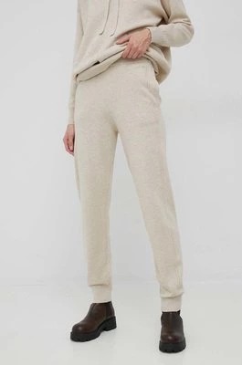 Zdjęcie produktu Calvin Klein spodnie dresowe z domieszką wełny damskie kolor beżowy gładkie