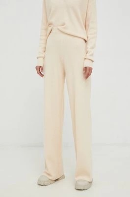 Zdjęcie produktu Calvin Klein spodnie z domieszką wełny damskie kolor beżowy proste high waist