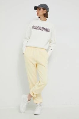 Zdjęcie produktu Champion spodnie dresowe damskie kolor żółty gładkie 115487-ASB