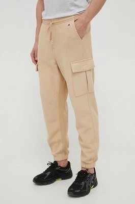 Zdjęcie produktu Champion spodnie dresowe kolor beżowy gładkie