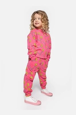 Zdjęcie produktu Coccodrillo spodnie dresowe dziecięce kolor różowy gładkie