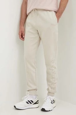Zdjęcie produktu Columbia spodnie dresowe CSC Logo męskie kolor beżowy gładkie 1911601