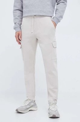 Zdjęcie produktu Columbia spodnie dresowe Trek kolor beżowy gładkie 2054462