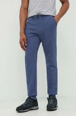 Zdjęcie produktu Columbia spodnie dresowe męskie kolor niebieski z nadrukiem