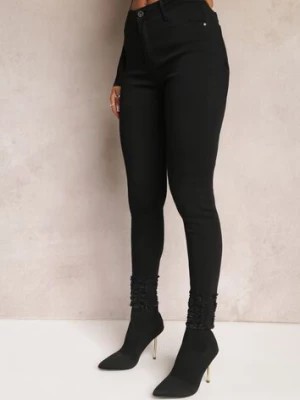Zdjęcie produktu Czarne Jeansy o Fasonie Skinny z Przetarciami na Krawędziach Ommath