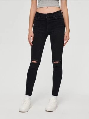 Zdjęcie produktu Czarne jeansy skinny fit mid waist z efektem push up House