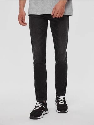 Zdjęcie produktu Czarne jeansy skinny fit z efektem sprania House