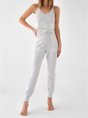 Zdjęcie produktu Damskie długie spodnie z bawełny z koronkowymi elemantami Snow Flake Poupee Marilyn