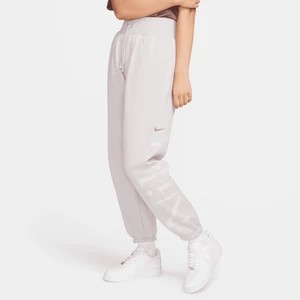 Zdjęcie produktu Damskie spodnie dresowe o kroju oversize z logo Nike Sportswear Phoenix Fleece - Fiolet