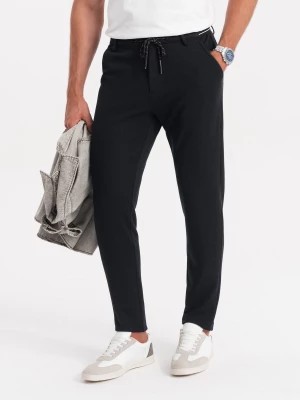 Zdjęcie produktu Dzianinowe spodnie męskie z gumką w pasie - czarne V4 OM-PACP-0116
 -                                    S
