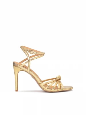 Zdjęcie produktu Eleganckie złote sandały z ozdobnym supełkiem Kazar