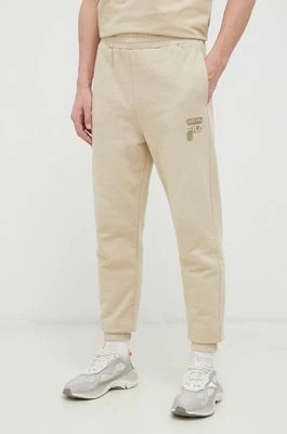 Zdjęcie produktu Fila spodnie dresowe bawełniane kolor beżowy gładkie