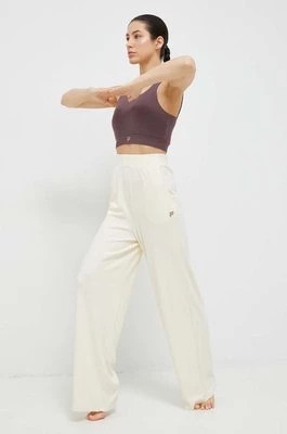 Zdjęcie produktu Fila spodnie dresowe Camaiore kolor beżowy
