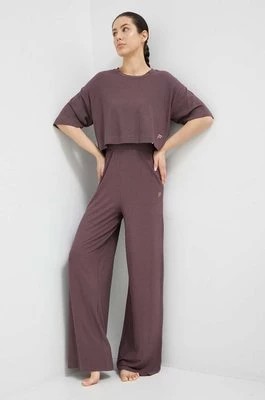 Zdjęcie produktu Fila spodnie dresowe Camaiore kolor fioletowy