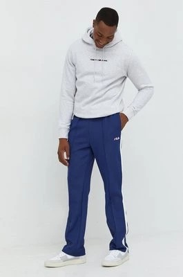 Zdjęcie produktu Fila spodnie dresowe męskie kolor granatowy z aplikacją