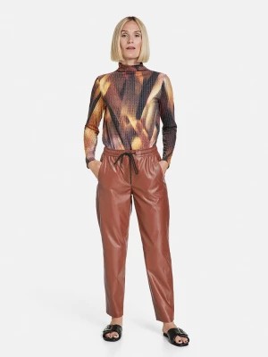 Zdjęcie produktu Gerry Weber Spodnie w kolorze ceglanym ze skóry syntetycznej rozmiar: 44