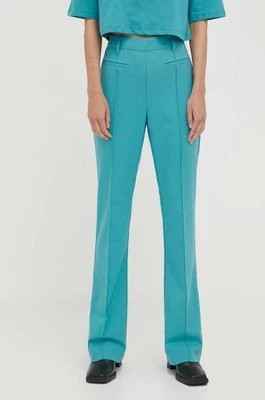 Zdjęcie produktu Gestuz spodnie Caisa damskie kolor zielony dzwony high waist