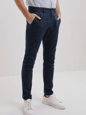 Zdjęcie produktu Granatowe lniane spodnie męskie OCHNIK