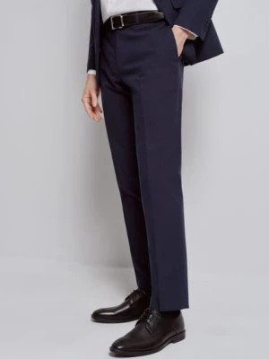 Zdjęcie produktu Granatowe spodnie garniturowe męskie OCHNIK
