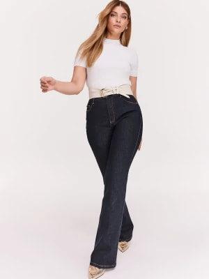 Zdjęcie produktu Granatowe spodnie jeansowe typu dzwony TARANKO