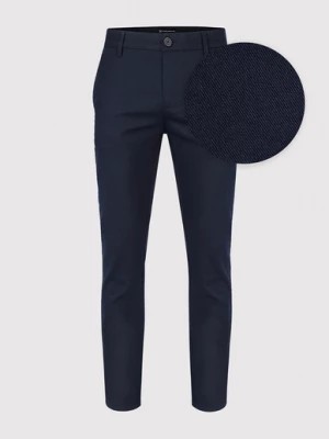 Zdjęcie produktu Granatowe spodnie męskie o kroju Slim Fit Pako Lorente