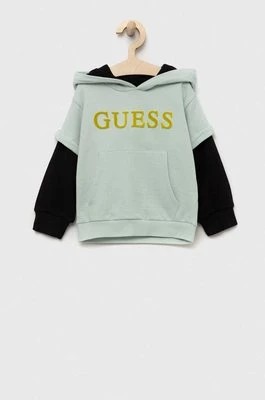 Zdjęcie produktu Guess bluza bawełniana dziecięca kolor turkusowy z kapturem wzorzysta