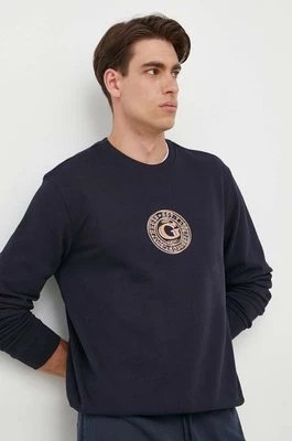 Zdjęcie produktu Guess bluza bawełniana męska kolor granatowy z aplikacją