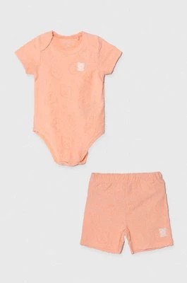 Zdjęcie produktu Guess komplet bawełniany niemowlęcy kolor pomarańczowy