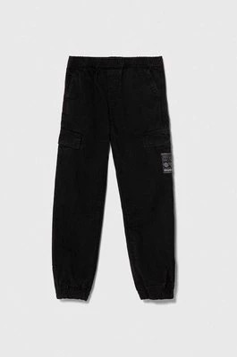 Zdjęcie produktu Guess spodnie bawełniane dziecięce kolor czarny gładkie