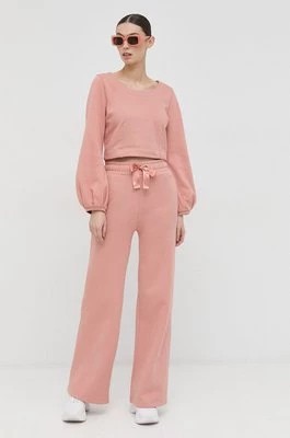 Zdjęcie produktu Guess spodnie dresowe bawełniane damskie kolor różowy