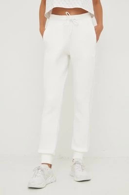 Zdjęcie produktu Guess spodnie dresowe ALLIE damskie kolor beżowy z aplikacją V2YB18 K7UW2