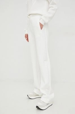 Zdjęcie produktu Guess spodnie dresowe BRENDA damskie kolor beżowy z nadrukiem V3RB21 K7UW2