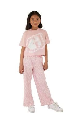 Zdjęcie produktu Guess spodnie dresowe dziecięce kolor różowy wzorzyste