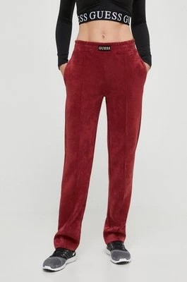 Zdjęcie produktu Guess spodnie dresowe kolor czerwony gładkie