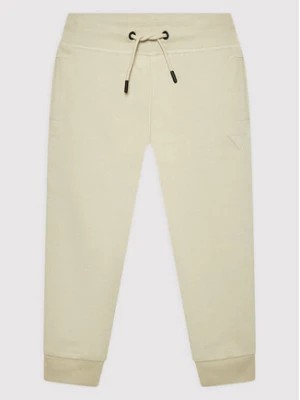 Zdjęcie produktu Guess Spodnie dresowe L2YQ46 KAIJ1 Beżowy Regular Fit