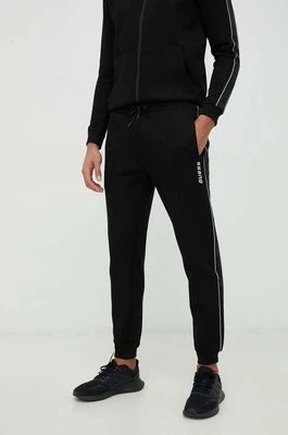 Zdjęcie produktu Guess spodnie dresowe MICKEY męskie kolor czarny z nadrukiem Z2YB09 KB3P2