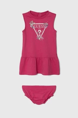 Zdjęcie produktu Guess sukienka bawełniana niemowlęca kolor różowy mini rozkloszowana