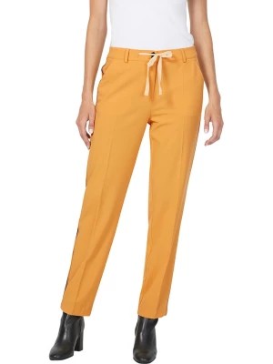Zdjęcie produktu Heine Spodnie w kolorze żółtym rozmiar: 42