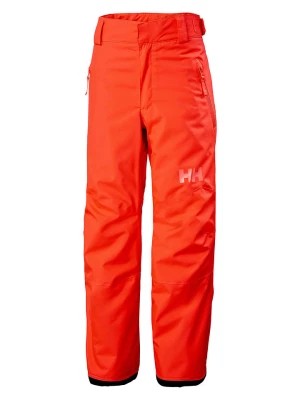 Zdjęcie produktu Helly Hansen Spodnie narciarskie "Legendary" w kolorze pomarańczowym rozmiar: 128